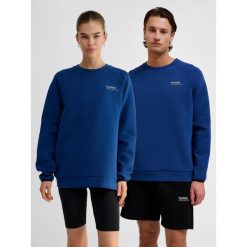 Bluza Hummel Tech. Niebieskie bluzy damskie Hummel, na zimę, bez wzorów, z bawełny, bez kaptura. Za 294.50 zł.