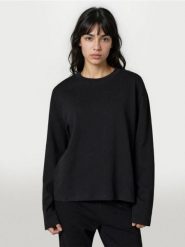 Bawełniana koszulka z gęstego splotu Interlock - czarny. Czarne koszulki damskie Sinsay, l, bez wzorów, z bawełny, bez kołnierzyka, bez ramiączek. Za 29.99 zł.