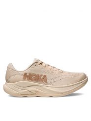 Hoka Buty do biegania Rincon 4 1155131 Beżowy. Brązowe obuwie sportowe damskie HOKA, z materiału, bez zapięcia, do biegania. Za 499.99 zł.
