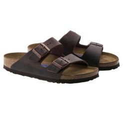 Sandały Damskie Ze Skóry Olejowanej Arizona. Brązowe sandały damskie Birkenstock, bez wzorów, z materiału, z otwartym noskiem, bez obcasa, bez zapięcia. Za 562.90 zł.