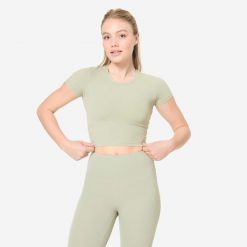 Koszulka do jogi i pilatesu Breathe. Zielone bluzki damskie DOMYOS, s, bez wzorów, z elastanu, sportowe, bez kołnierzyka, bez ramiączek. W wyprzedaży za 49.99 zł.