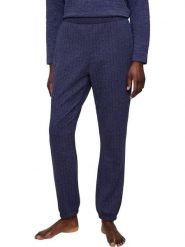 Triumph Spodnie dresowe w kolorze granatowym rozmiar: 36. Niebieskie spodnie dresowe damskie Triumph, bez wzorów, z dresówki. Za 82.83 zł.