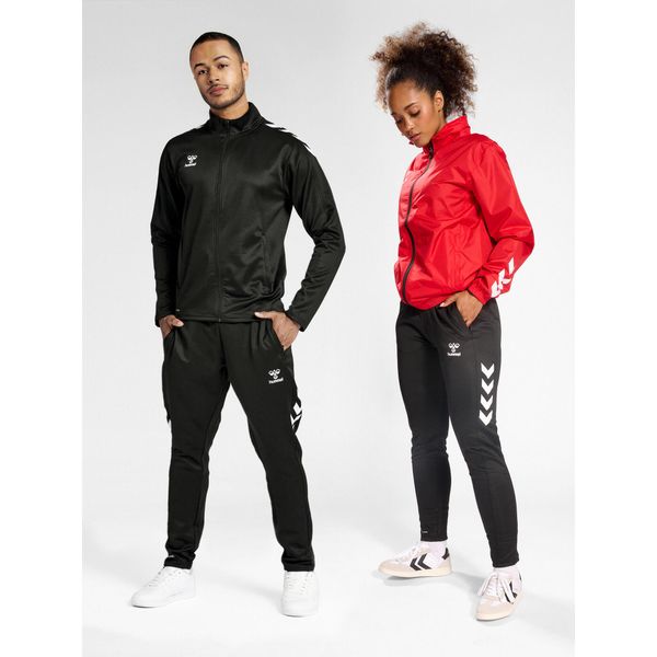 Spodnie treningowe Hummel Core XK Poly. Czarne spodnie dresowe damskie Hummel, bez wzorów. Za 170.00 zł.