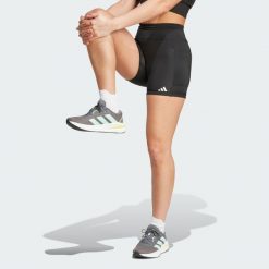 Legginsy Own the Run Short. Fioletowe legginsy damskie Adidas, xs, bez wzorów, z materiału. Za 219.00 zł.