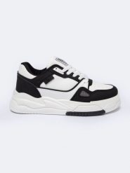 Sneakersy damskie ze skóry ekologicznej biało-czarne NN274669 101. Białe obuwie sportowe damskie Big Star, ze skóry ekologicznej, bez zapięcia. Za 159.99 zł.