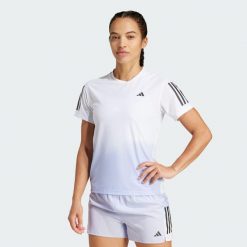 Koszulka Own the Run CLIMACOOL Colorblock. Białe bluzki damskie Adidas, xs, bez wzorów, bez kołnierzyka, bez ramiączek. W wyprzedaży za 107.40 zł.