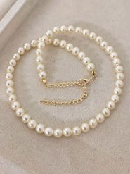 Luja Bijoux Naszyjnik perłowy - dł. 42 cm rozmiar: onesize. Białe naszyjniki damskie Luja Bijoux, z perłą, pozłacane. Za 57.06 zł.
