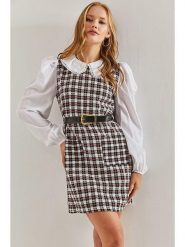 Bianco Lucci Sukienka w kolorze czarno-białym rozmiar: M. Białe sukienki damskie Bianco Lucci, bez wzorów, ze skóry, bez ramiączek. Za 130.99 zł.