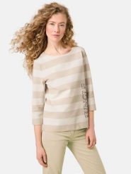 Gerry Weber Koszulka w kolorze beżowo-kremowym rozmiar: 42. Brązowe bluzki damskie Gerry Weber, bez wzorów, bez kołnierzyka, bez ramiączek. Za 136.13 zł.