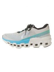 ON RUNNING Buty "Cloudmonster 2" w kolorze beżowo-niebieskim do biegania rozmiar: 42. Brązowe obuwie sportowe damskie On Running, bez zapięcia, do biegania. Za 503.95 zł.