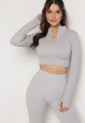 Jasnoszara Bluzka Zapinana na Suwak z Wycięciem przy Ściągaczu Aisllain. Szare bluzki damskie Born2be, bez wzorów, eleganckie, bez kołnierzyka, bez ramiączek. Za 34.99 zł.