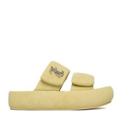 Klapki Juicy Couture. Żółte klapki damskie Juicy Couture, bez wzorów, bez obcasa, bez zapięcia. Za 249.99 zł.