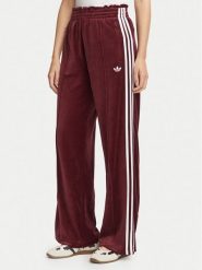 Adidas Spodnie dresowe Velour LG4291 Bordowy Loose Fit. Czerwone spodnie dresowe damskie Adidas, s, bez wzorów, z bawełny. Za 299.99 zł.