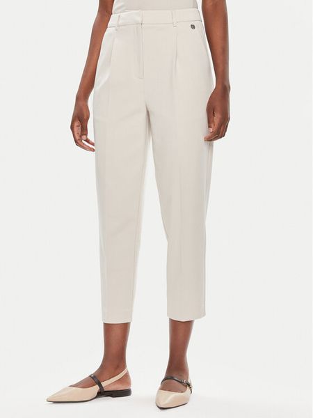 Tamaris Apparel Chinosy Comiso TAW0499 Écru Regular Fit. Spodnie materiałowe damskie Tamaris Apparel, bez wzorów, z syntetyku. Za 369.99 zł.