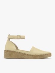 Waniliowe espadryle na platformie. Brązowe espadryle damskie Ryłko, bez wzorów, ze skóry, bez obcasa, na platformie. Za 329.99 zł.