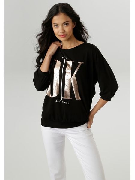 Aniston Koszulka w kolorze czarnym rozmiar: 40. Czarne koszulki damskie Aniston, bez wzorów, bez kołnierzyka, bez ramiączek. Za 52.42 zł.