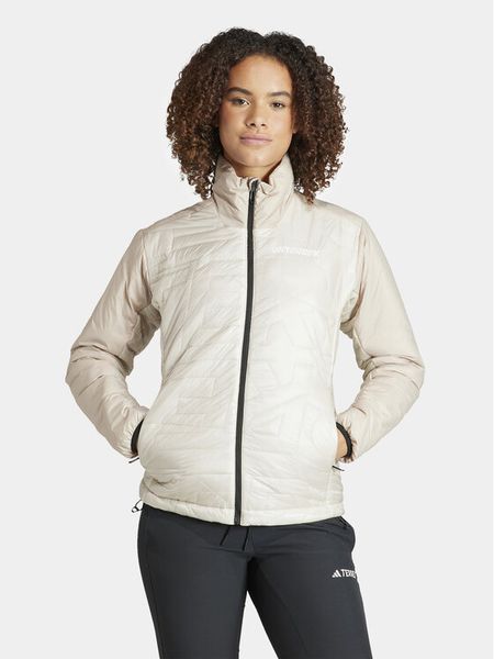 Adidas Kurtka outdoor IB4179 Beżowy Regular Fit. Brązowe kurtki sportowe damskie Adidas, s, bez wzorów, z syntetyku, bez kaptura. Za 639.99 zł.