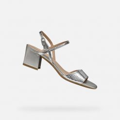 Sandały GEOX D NEW ERAKLIA 50 Srebrny. Szare sandały damskie Geox, bez wzorów, ze skóry, bez obcasa, bez zapięcia. Za 435.99 zł.
