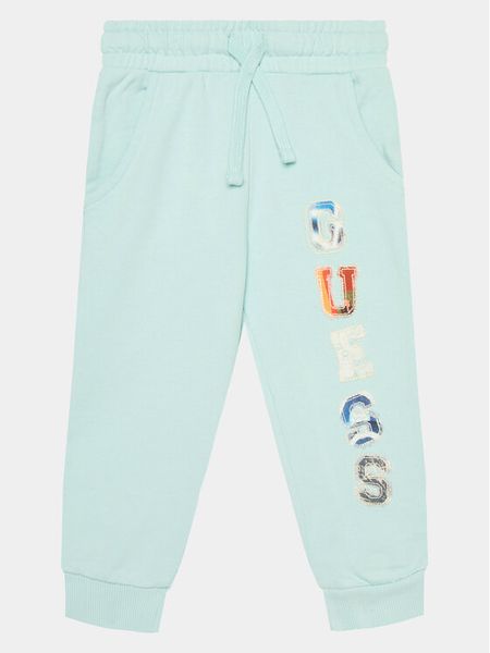 Guess Spodnie dresowe N4GQ11 KA6R3 Niebieski Regular Fit. Niebieskie spodnie dresowe chłopięce Guess, z bawełny. Za 169.99 zł.