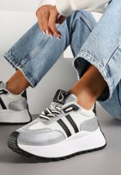 Biało-Srebrne Sznurowane Sneakersy Vices na Grubej Podeszwie z Metaliczną Wstawką Nelenia. Białe obuwie sportowe damskie Born2be, z jeansu, bez zapięcia. Za 119.99 zł.