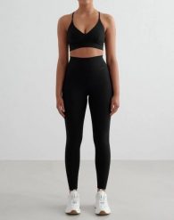 Damskie legginsy wysoki stan, odprowadzające pot, squat proof Sense Tall czarne. Czarne legginsy damskie Aim'n, l, bez wzorów, z elastanu. Za 301.00 zł.