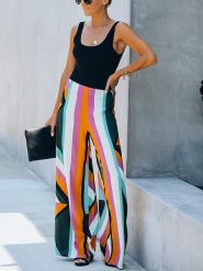 Milan Kiss Spodnie ze wzorem rozmiar: XL. Spodnie materiałowe damskie Milan Kiss, bez wzorów, z materiału. Za 153.71 zł.