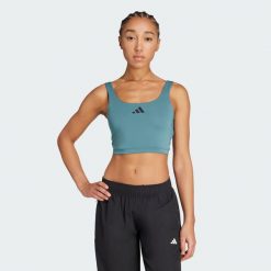 Koszulka Power Light Support Bra. Białe bluzki damskie Adidas, xs, bez wzorów, bez kołnierzyka, bez ramiączek. Za 199.00 zł.