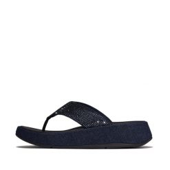 Klapki między palcami damskie FitFlop F-Mode. Niebieskie klapki damskie FIT FLOP, bez wzorów, z materiału, bez obcasa, bez zapięcia. Za 555.50 zł.