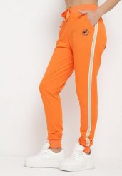 Pomarańczowe Spodnie Dresowe z Ozdobnym Lampasem Adiska. Brązowe spodnie dresowe damskie Born2be, l, bez wzorów, z dresówki. Za 34.99 zł.