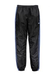 Adidas Spodnie dresowe w kolorze czarno-niebieskim rozmiar: L. Czarne spodnie dresowe damskie Adidas, l, bez wzorów, z dresówki. Za 131.12 zł.