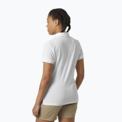 Koszulka polo damska Helly Hansen Siren Polo. Białe bluzki damskie Helly Hansen, bez wzorów, bez kołnierzyka, bez ramiączek. Za 179.99 zł.