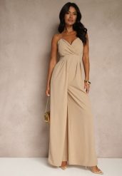 Ciemnobeżowy Kombinezon na Cienkich Ramiączkach z Kopertowym Dekoltem i Szerokimi Nogawkami Jovantia. Brązowe sukienki damskie Renee, bez wzorów, eleganckie, bez ramiączek. Za 139.99 zł.