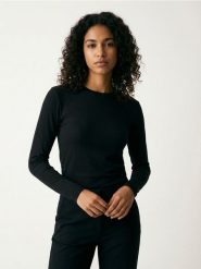 Koszulka poliamidowa z długim rękawem - czarny. Czarne koszulki damskie Sinsay, l, bez wzorów, z poliamidu, bez kołnierzyka, bez ramiączek. Za 29.99 zł.
