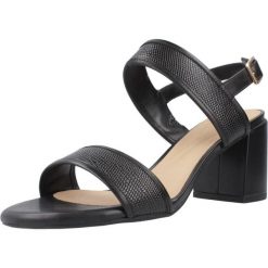 Sandały Clarks Model Ezoria Sling Kolor Czarny. Czarne sandały damskie Clarks, bez wzorów, ze skóry, bez obcasa, na obcasie, bez zapięcia. Za 359.60 zł.