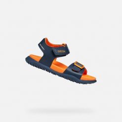 Sandały GEOX J SANDAL FUSBETTO BO Niebieski. Brązowe sandały damskie Geox, bez wzorów, ze skóry, bez obcasa, bez zapięcia. Za 188.99 zł.