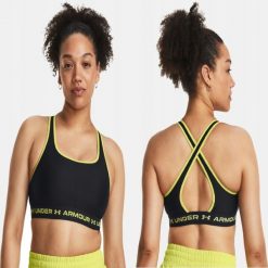Stanik fitness cardio Under Armour Crossback Mid. Czarne biustonosze sportowe damskie Under Armour, bez wzorów. Za 83.99 zł.
