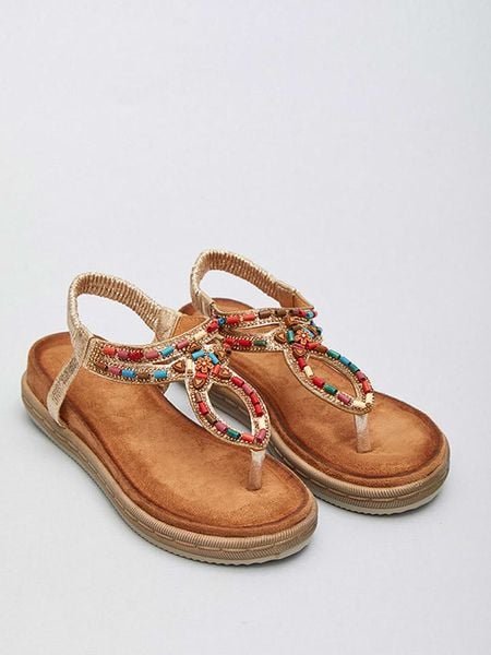 Bellucci Sandały w kolorze złotym rozmiar: 41. Żółte sandały damskie Bellucci, bez wzorów, z otwartym noskiem, bez obcasa, bez zapięcia. Za 92.21 zł.