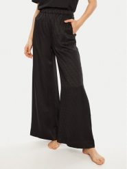 Calvin Klein Spodnie piżamowe 000QS7304E Czarny Relaxed Fit. Czarne piżamy damskie Calvin Klein, bez wzorów, z syntetyku, bez ramiączek. Za 219.99 zł.