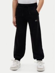 Tommy Hilfiger Spodnie dresowe KG0KG09531 Czarny Regular Fit. Czarne spodnie dresowe dziewczęce Tommy Hilfiger, bez wzorów, z bawełny. Za 329.99 zł.