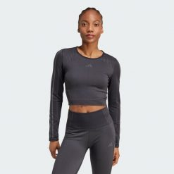 Koszulka Knit Long Sleeve. Czarne koszulki damskie Adidas, m, bez wzorów, z materiału, bez kołnierzyka, bez ramiączek. W wyprzedaży za 196.60 zł.