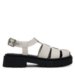 Sandały Steve Madden. Białe sandały damskie Steve Madden, bez wzorów, bez obcasa, na płaskiej podeszwie, bez zapięcia. Za 359.99 zł.