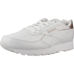 Tenisówki Reebok Model Rewind Run Kolor Biały. Białe trampki damskie Reebok, bez wzorów, z materiału, bez zapięcia. Za 195.30 zł.