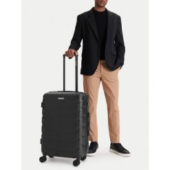 Walizka średnia GINO ROSSI. Czarne walizki Gino Rossi, bez wzorów, średnie. Za 279.99 zł.