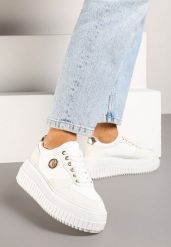 Białe Sneakersy Vices na Grubej Podeszwie z Metaliczną Ozdobą i Sznurowaniem Niliri. Białe obuwie sportowe damskie Born2be, z jeansu, bez zapięcia. Za 84.99 zł.