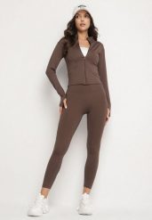 Brązowy Komplet Sportowy Bluza z Wycięciem na Kciuk i Legginsy Redinelle. Brązowe legginsy sportowe damskie Born2be, l, bez wzorów, z podwyższonym stanem, do biegania. Za 139.99 zł.