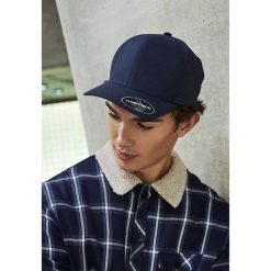 Czapka Flexfit delta Adjustable. Niebieskie czapki z daszkiem damskie FLEXFIT, bez wzorów. Za 167.50 zł.