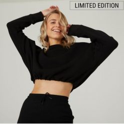 Bluza damska Domyos Gym & Pilates crop. Czarne bluzy damskie DOMYOS, m, bez wzorów, z bawełny, bez kaptura. W wyprzedaży za 59.99 zł.