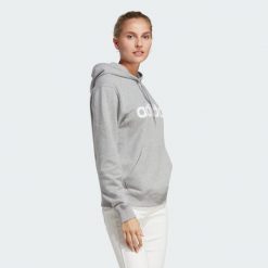 Bluza z kapturem Essentials Linear. Białe bluzy damskie Adidas, l, bez wzorów, z kapturem. Za 199.00 zł.