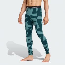 Legginsy bazowe Multi Synthetic Base Layer. Niebieskie legginsy damskie Adidas, s, bez wzorów. W wyprzedaży za 142.35 zł.