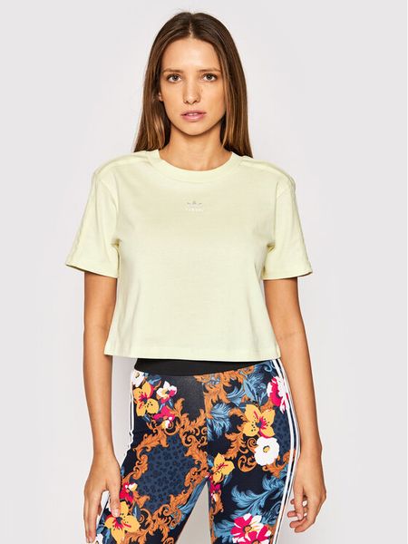 Adidas Koszulka techniczna Luxe H56452 Żółty Regular Fit. Żółte koszulki damskie Adidas, bez wzorów, z bawełny, bez kołnierzyka, bez ramiączek. Za 59.99 zł.